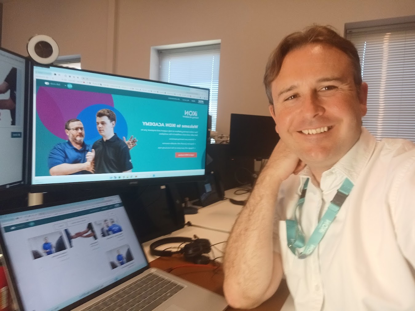 Richard Williams at his desk with the IKON Academy website on screen - building and managing digital learning platforms